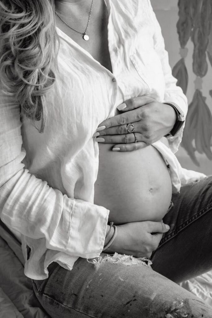 Pregnant Woman Holding Her Belly 